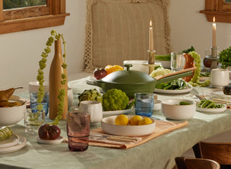 our place dinnerware assortment set on table with green always pan