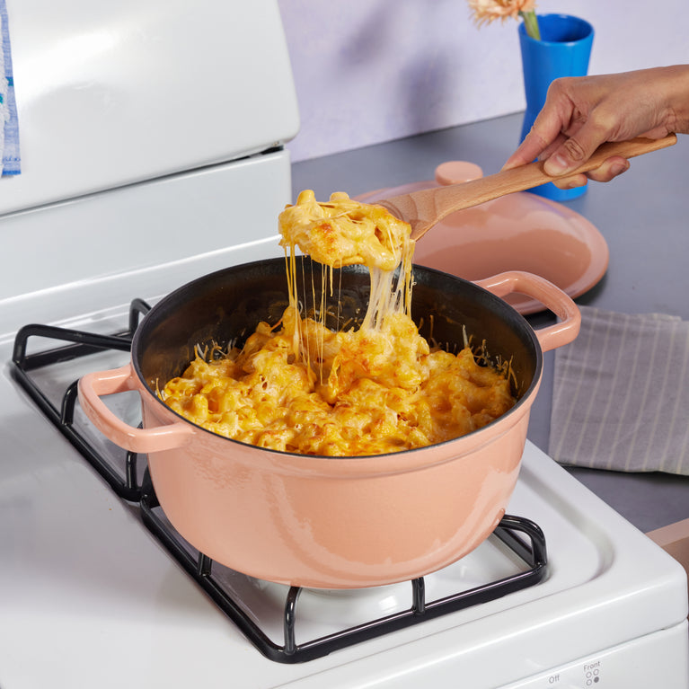 Pink Cast Iron Perfect Pot with mac and cheese on stovetop