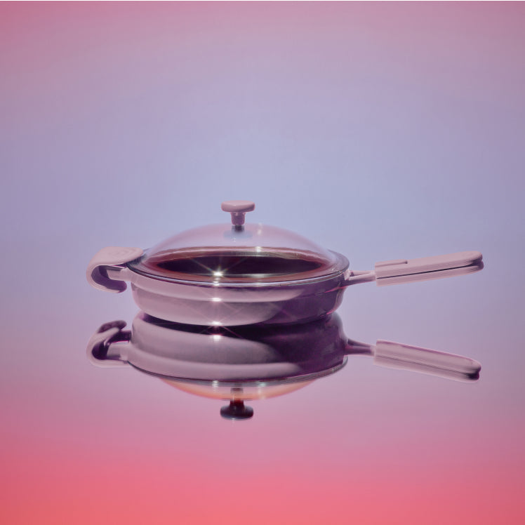 Purple Cast Iron Always Pan with reflective background