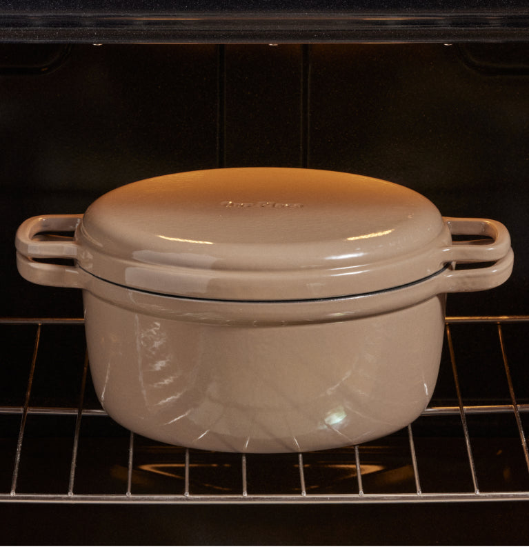 beige cast iron perfect pot and cast iron hot grill in oven