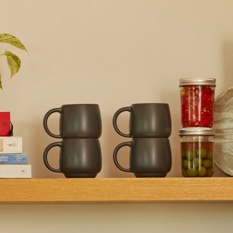 Black Night + Day Mugs on a shelf