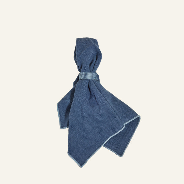 Folded blue Loop Napkins