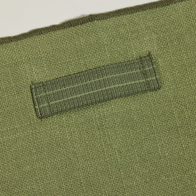 Close up of the built-in ring in a green Loop Napkin