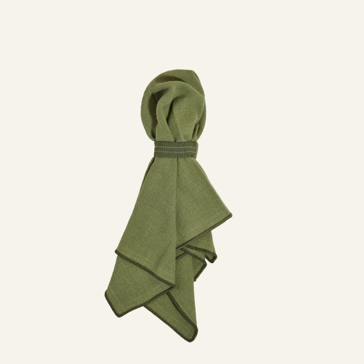 Folded green Loop Napkins