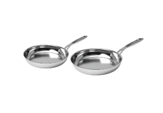 Two stainless steel frying pans of different sizes with metal handles, placed side by side on a plain light background.