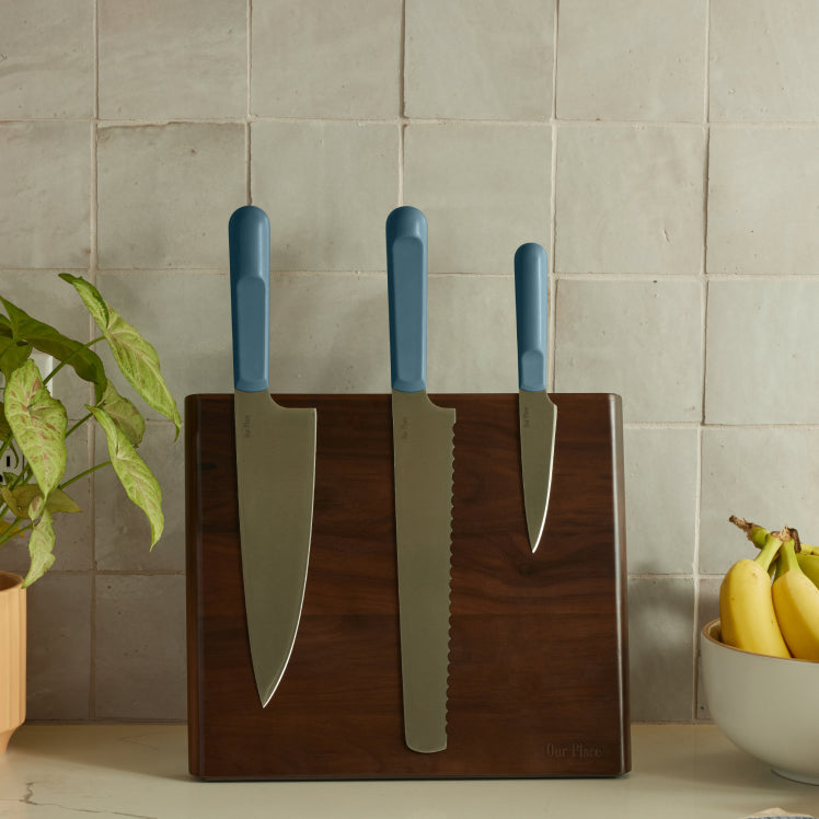 blue knife trio on walnut knife block