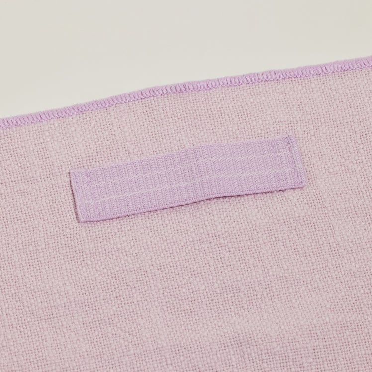 Close up of the built-in ring in a purple Loop Napkin