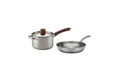 A stainless steel saucepan with a lid and brown handle next to a stainless steel frying pan with a metal handle, both on a plain white background.