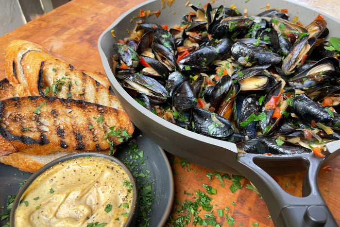 mussels in tomato stew cooking in always pan