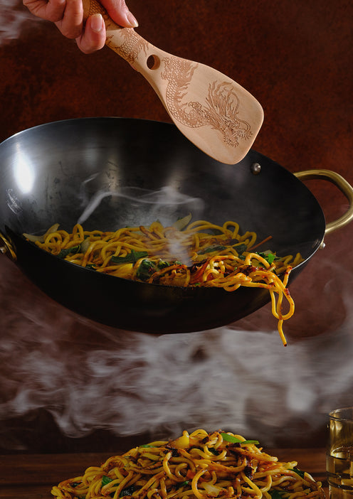 cooking noodles in hot wok