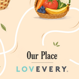 A basket of produce including a carrot, tomato, cauliflower, blueberries, and a banana above the text Our Place and the Lovevery logo.