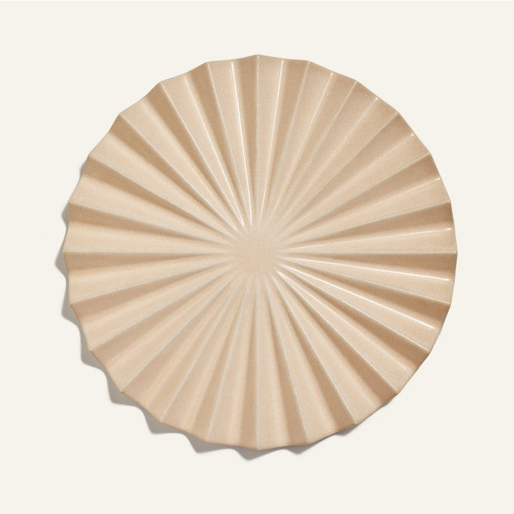 beige pleat trivet