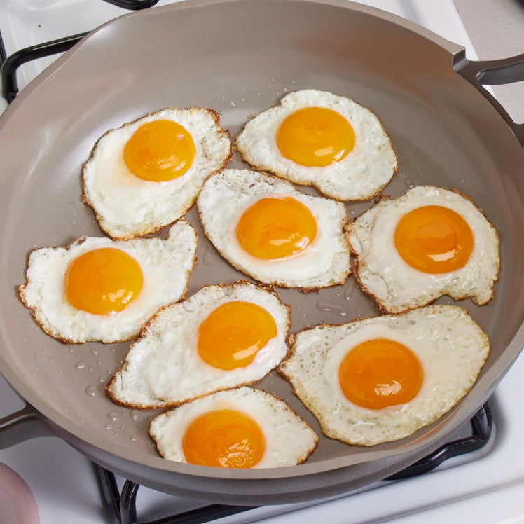 Cooking eight eggs in a black Large Always Pan