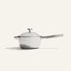 A polished metal Titanium Perfect Pot Pro 3 qt. saucepan with a matching lid and a long side handle.