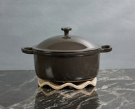 char cast iron perfect pot on wave trivet