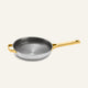 Titanium Always Pan Pro 10.5″ frying pan with a textured interior and gold-colored handles.
