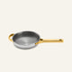 A silver Titanium Always Pan Pro 8.5″ frying pan with a textured interior and gold-toned handles.