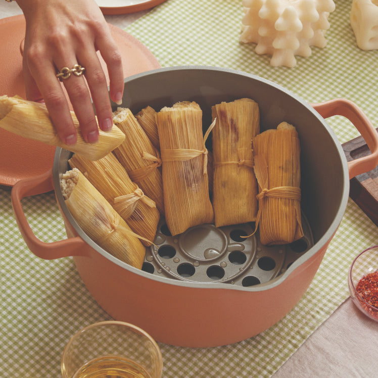 grey roasting rack inside pink perfect pot cooking tamales