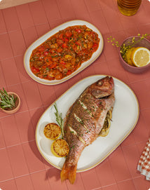 Whole Roasted Fish with Cherry Tomato Salsa on white serving platters