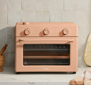 pink lage wonder oven on counter