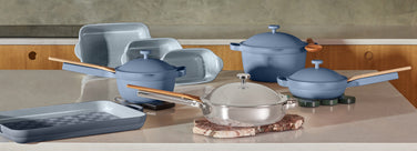 Blue salt ultimate cookware set with titanium always pan pro on counter