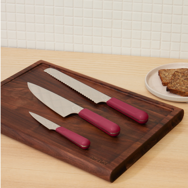 Red Knife Trio on top of the Walnut Cutting Board