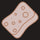 A rectangular sponge with several holes.
